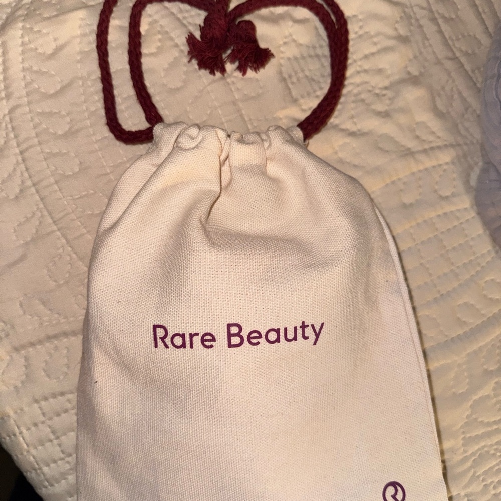 Rare Beauty Ivory Pouch with Burgundy Cord